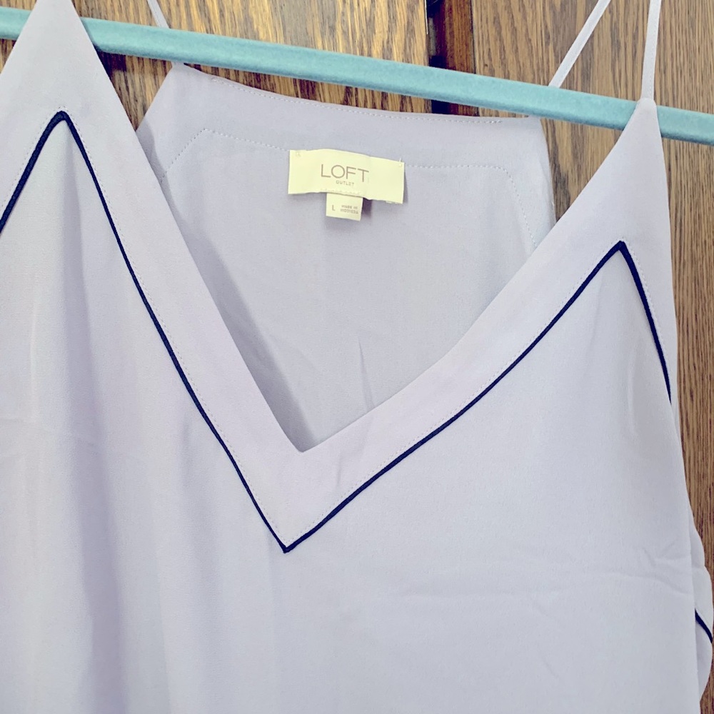 Loft outlet tank